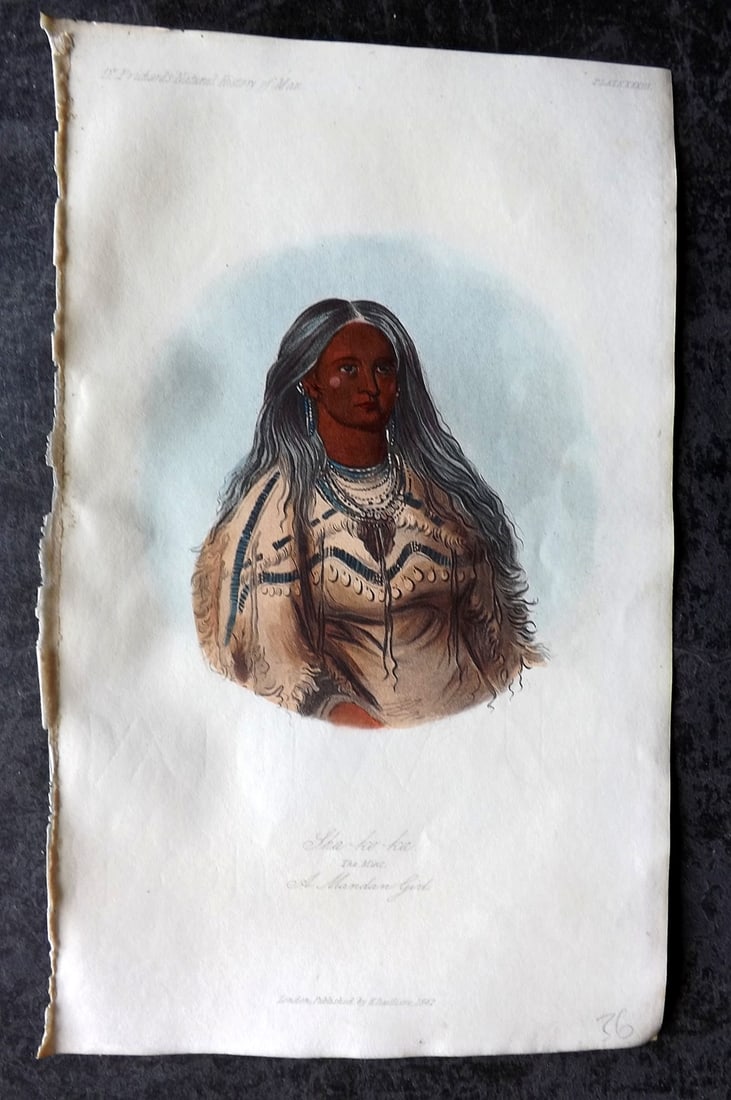 Prichard, James 1845 HCol Print. USA - Sha-ko-ka, a Mandan Girl Native American 33: Hand Colored Aquatint Published 1845 London for "The Natural History of Man" by James Cowles Prichard. Paper Size: 9 x 5.5 inch (23.5 x 14cm) Good Condition