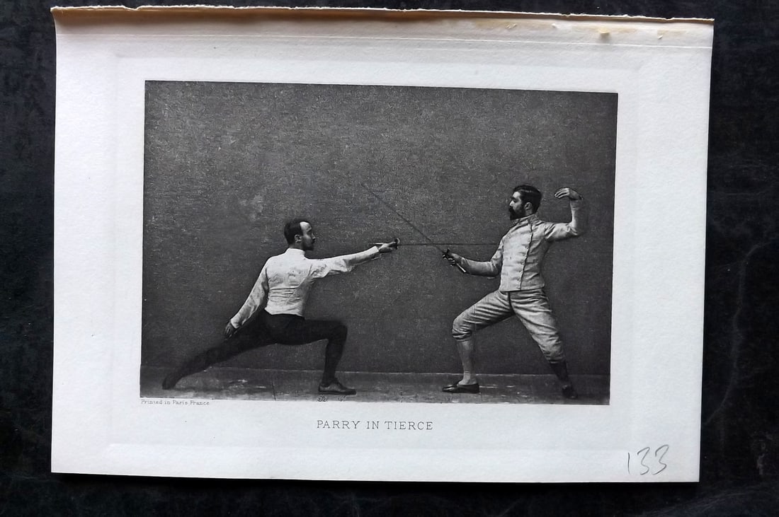 Badminton Library 1907 Antique Sword Fencing Print. Parry in Tierce.: Photogravure Published 1907, London for "The Badminton Library of Sports and Pastimes..." by Walter H. Pollock, E. B. Michell, and Walter Armstrong.Paper Size: 7.5 x 5 inch (19 x 13cm) Good Condition