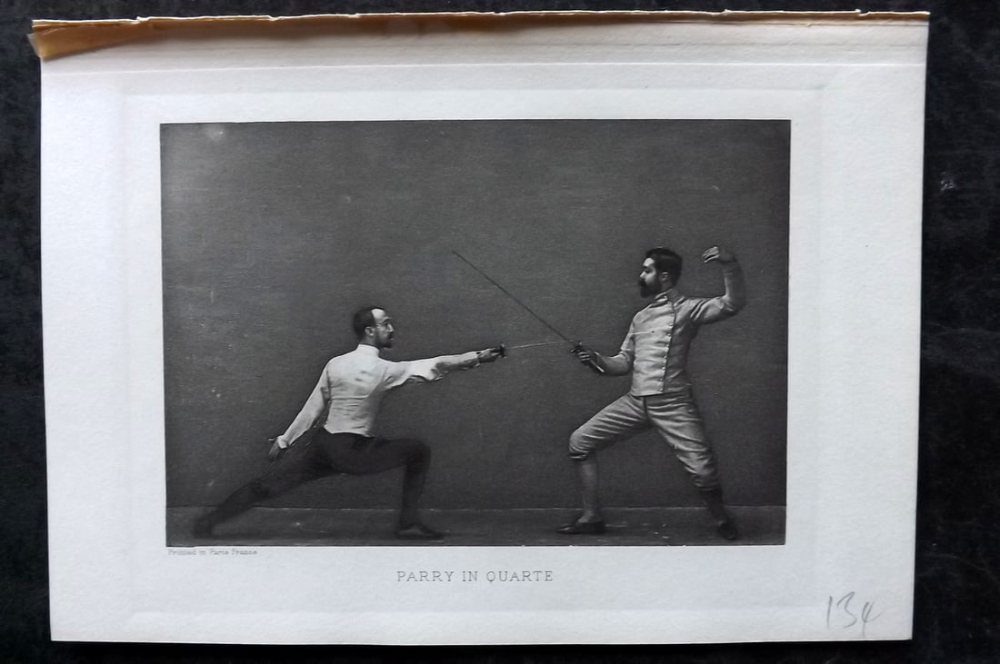 Badminton Library 1907 Antique Sword Fencing Print. Parry in Quarte.: Photogravure Published 1907, London for "The Badminton Library of Sports and Pastimes..." by Walter H. Pollock, E. B. Michell, and Walter Armstrong.Paper Size: 7.5 x 5 inch (19 x 13cm) Good Condition