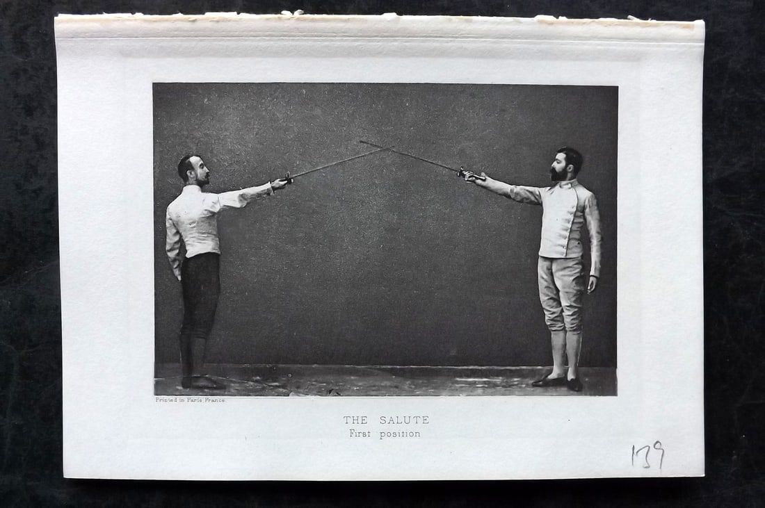Badminton Library 1907 Antique Sword Fencing Print. The Salute. First Position.: Photogravure Published 1907, London for "The Badminton Library of Sports and Pastimes..." by Walter H. Pollock, E. B. Michell, and Walter Armstrong.Paper Size: 7.5 x 5 inch (19 x 13cm) Good Condition