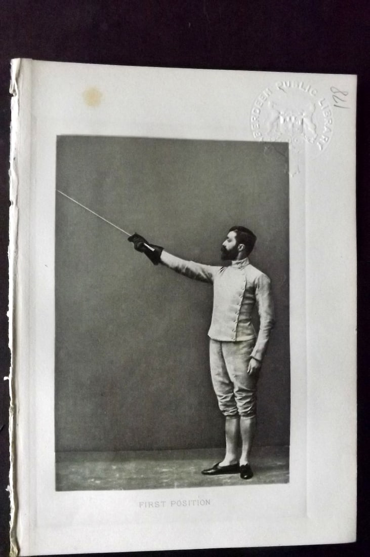 Badminton Library 1889 Antique Sword Fencing Print. First Position.: Photogravure Published 1889, London for "The Badminton Library of Sports and Pastimes..." by Walter H. Pollock, E. B. Michell, and Walter Armstrong.Paper Size: 7.5 x 5 inch (19 x 13cm) Discrete Librar