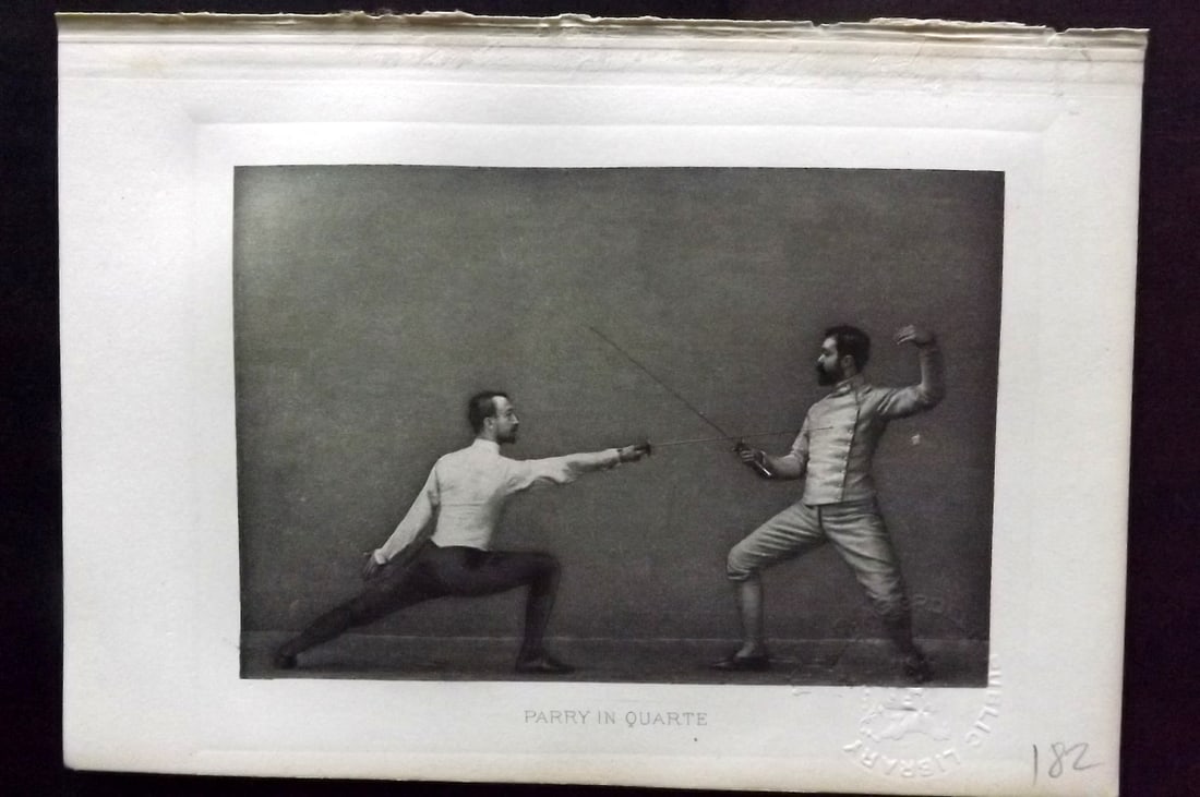 Badminton Library 1889 Antique Sword Fencing Print. Parry in Quarte.: Photogravure Published 1889, London for "The Badminton Library of Sports and Pastimes..." by Walter H. Pollock, E. B. Michell, and Walter Armstrong.Paper Size: 7.5 x 5 inch (19 x 13cm) Discrete Librar