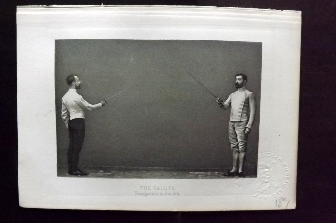 Badminton Library 1889 Antique Sword Fencing Print. The Salute. Recognition to the left.: Photogravure Published 1889, London for "The Badminton Library of Sports and Pastimes..." by Walter H. Pollock, E. B. Michell, and Walter Armstrong.Paper Size: 7.5 x 5 inch (19 x 13cm) Discrete Librar