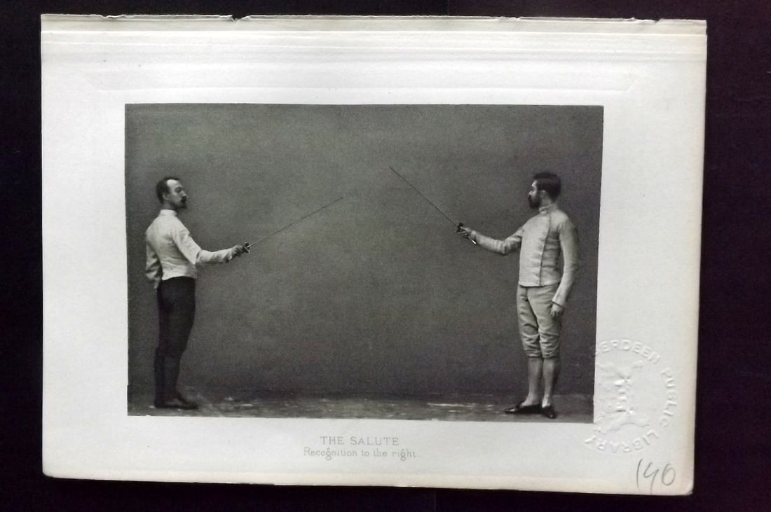 Badminton Library 1889 Antique Sword Fencing Print. The Salute. Recognition to the right.: Photogravure Published 1889, London for "The Badminton Library of Sports and Pastimes..." by Walter H. Pollock, E. B. Michell, and Walter Armstrong.Paper Size: 7.5 x 5 inch (19 x 13cm) Discrete Librar