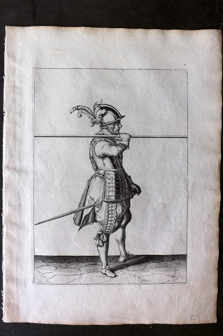 Gheyn, Jacob de 1608 Folio Military Print. Pikeman 10: Folio Copper Plate Published 1608, The Hague for "The Exercise of Arms, for Calivres, Muskettes and Pikes" by Jacob de Gheyn. Paper Size: 14 x 10 inch (36 x 25cm) Good Condition