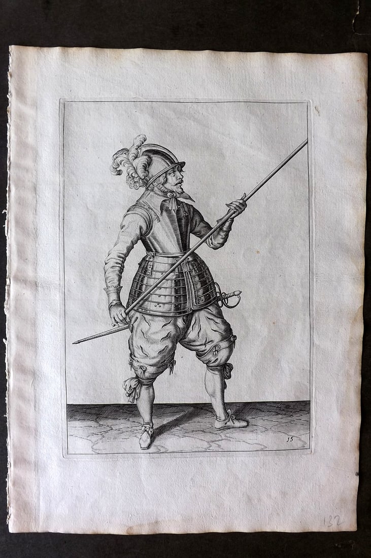 Gheyn, Jacob de 1608 Folio Military Print. Pikeman 15: Folio Copper Plate Published 1608, The Hague for "The Exercise of Arms, for Calivres, Muskettes and Pikes" by Jacob de Gheyn. Paper Size: 14 x 10 inch (36 x 25cm) Very minor margin water staining. Goo