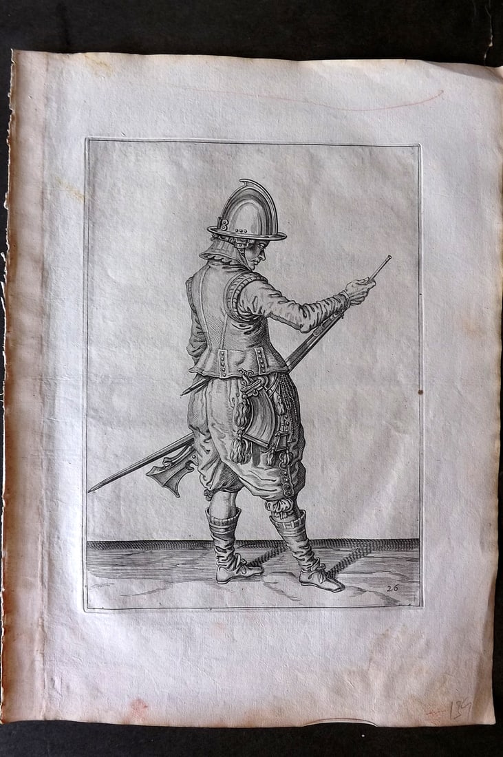 Gheyn, Jacob de 1608 Folio Military Print. Musketeer 26: Folio Copper Plate Published 1608, The Hague for "The Exercise of Arms, for Calivres, Muskettes and Pikes" by Jacob de Gheyn. Paper Size: 14 x 10 inch (36 x 25cm) Good Condition
