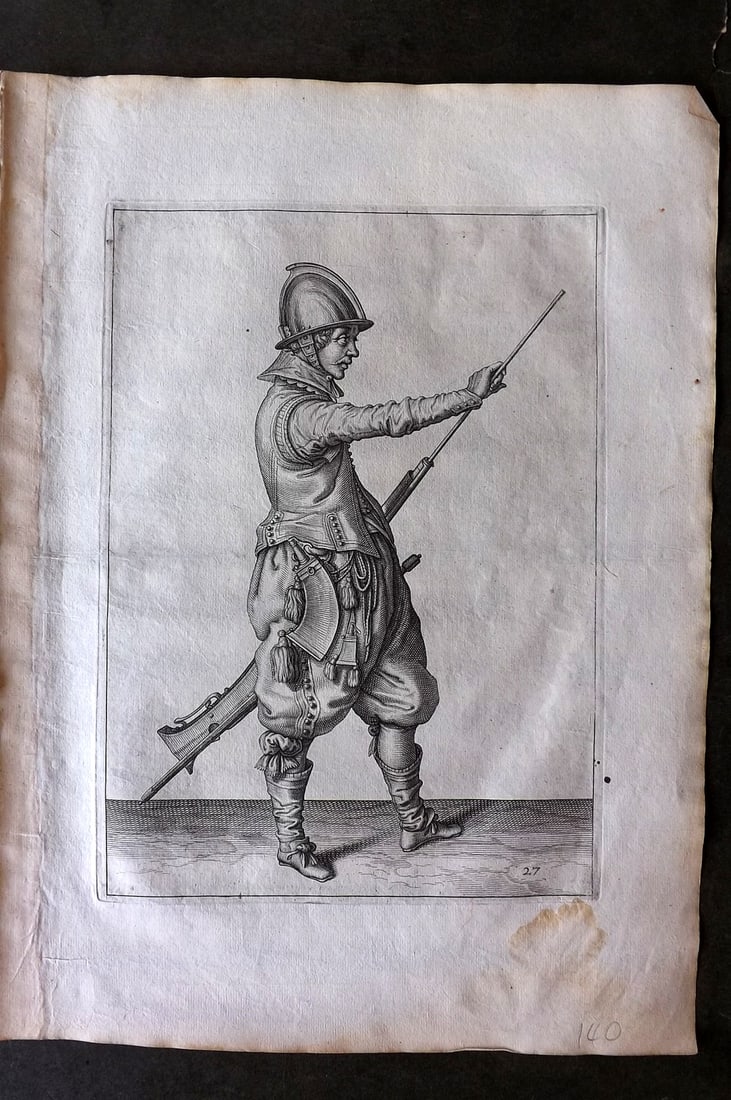 Gheyn, Jacob de 1608 Folio Military Print. Musketeer 27: Folio Copper Plate Published 1608, The Hague for "The Exercise of Arms, for Calivres, Muskettes and Pikes" by Jacob de Gheyn. Paper Size: 14 x 10 inch (36 x 25cm) Very minor margin water staining. Goo