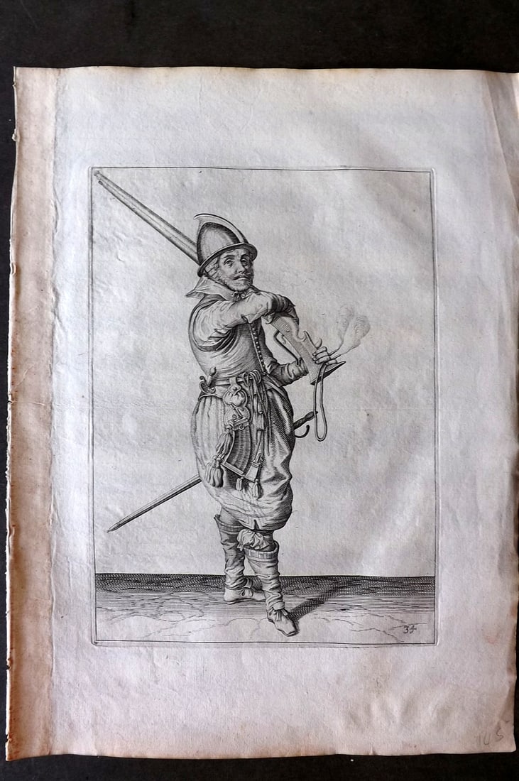 Gheyn, Jacob de 1608 Folio Military Print. Musketeer 34: Folio Copper Plate Published 1608, The Hague for "The Exercise of Arms, for Calivres, Muskettes and Pikes" by Jacob de Gheyn. Paper Size: 14 x 10 inch (36 x 25cm) Good Condition