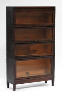 Globe-Wernicke 4 Tier Mahogany Barrister Bookcase: OHIO, CIRCA 1920 A four tier mahogany barrister bookcase manufactured by the Globe-Wernicke Company of Cincinnati, Ohio. All four sections retain their original label.