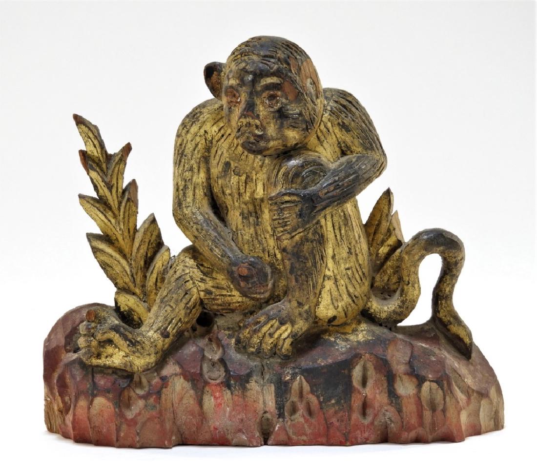 Antique Chinese Carved Gilt Wood Erotic Monkey: CHINA, 19TH-EARLY 20TH CENTURY An antique Chinese carved and gilt wood erotic monkey sculpture. The monkey is depicted seated on rockery fondling his genitalia. Dimensions : 6" tall by 6 3/4" wide by 