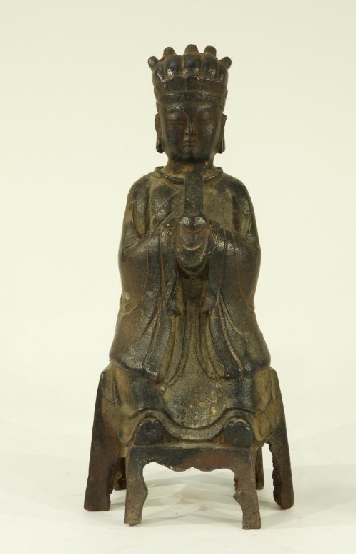 Ming Dynasty Cast Iron Figure of a Bodhisattva: CHINA, MING DYNASTY A Chinese cast iron figure of a Bodhisattva. The figure is depicted seated on a throne wearing a long robe. Notice the simplistic serenity of the casting in his face. Dimensions :