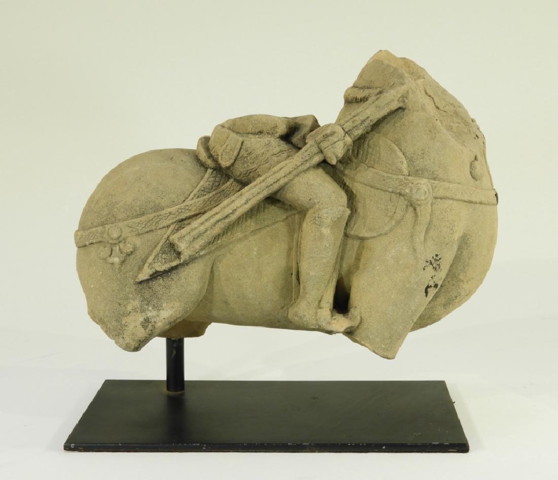 Thai Sandstone Fragment Carving of Horse & Rider: THAILAND, 18TH-19TH CENTURY A Thai sandstone fragment carving of a horse and rider. The horse was naturalistically carved with defined form and detailed armor in relief. Dimensions : Fragment measures