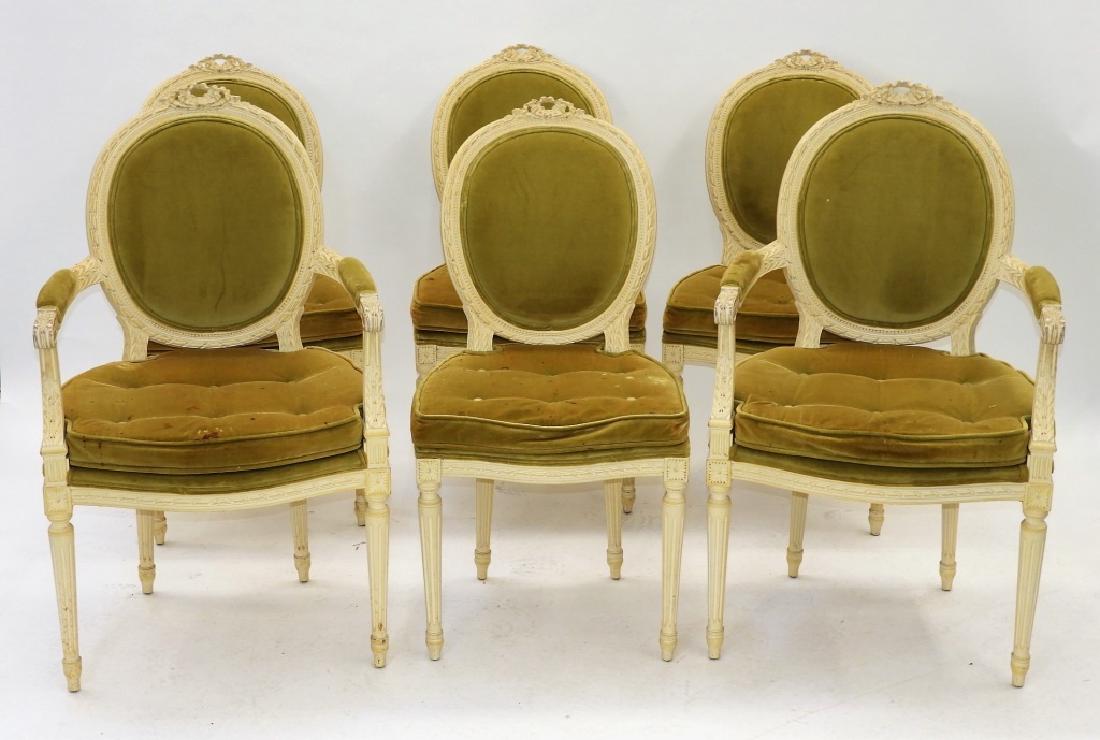 6 Leopold & Colombo French Provincial White Chairs: FRANCE/UNITED STATES, 20TH CENTURY A set of six French Provincial carved and white painted wood chairs imported by Leopold and Colombo, New York, New York. The chairs exhibit classical styling with fl