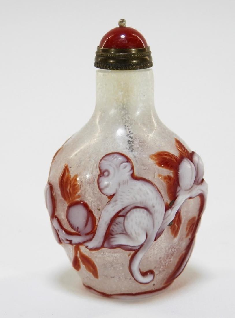 Chinese Carved Iron Red Peking Glass Snuff Bottle (1 of 7)