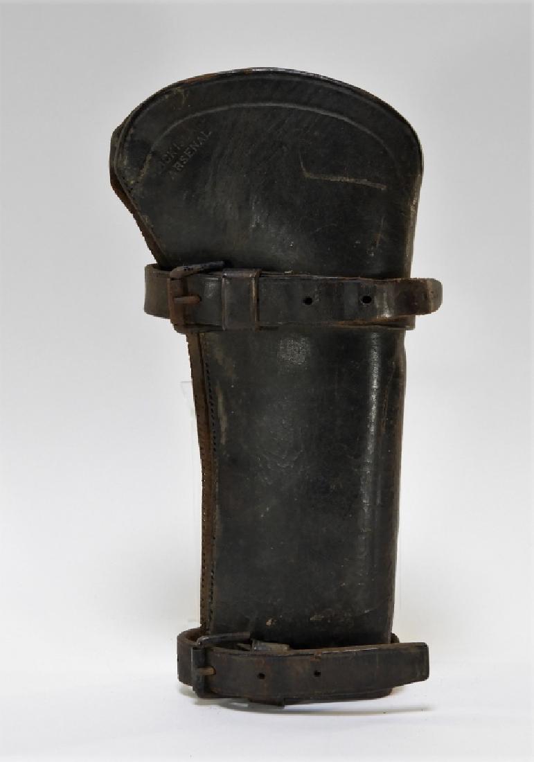 19C. Leather Gun Stock Cover Rock Island Arsenal: ILLINOIS, 19TH CENTURY A leather gun stock cover from the Rock Island Arsenal. Stamped with "Rock Island Arsenal" on outside near butt. Measures 11 1/2" long