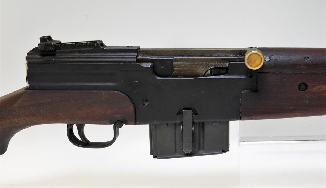 French MAS Mle 1944 Semi Automatic Rifle: France,1944/5 French MAS Mle 1944 semi automatic rifle, serial number F5875, (1) magazine, a limited production of about 7,000. 42 1/2" inches long