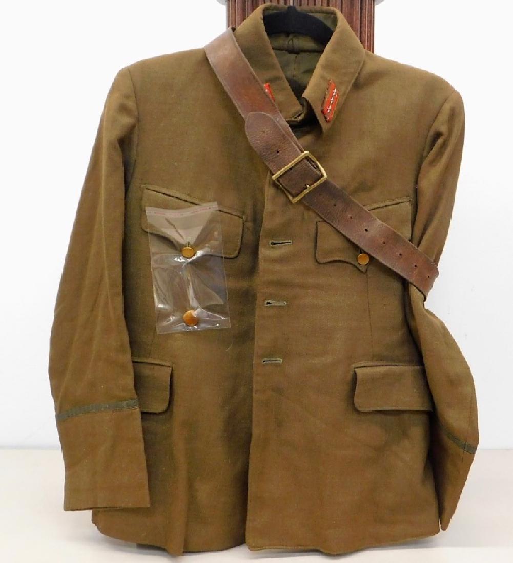WWII Japanese Army Captains Summer Uniform: Japan,1935- 1945 WWII Japanese Army captains summer uniform with tunic and pants, embroidered name of the officer on the inside lining. Tailored with a slot for officers sword with pants.