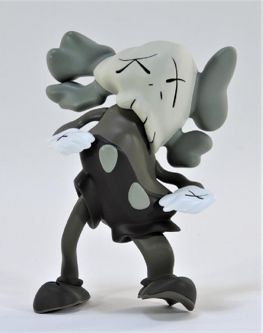 KAWS X Robert Lazzarini Companion Brown: KAWS New Jersey, New York,b.1974 KAWS X Robert Lazzarini, Companion (Brown), 2010, edition of 1,000. Painted cast vinyl 9" x 5" x 3" Stamped on the underside of feet. Published by Medicom Toy, Tokyo.