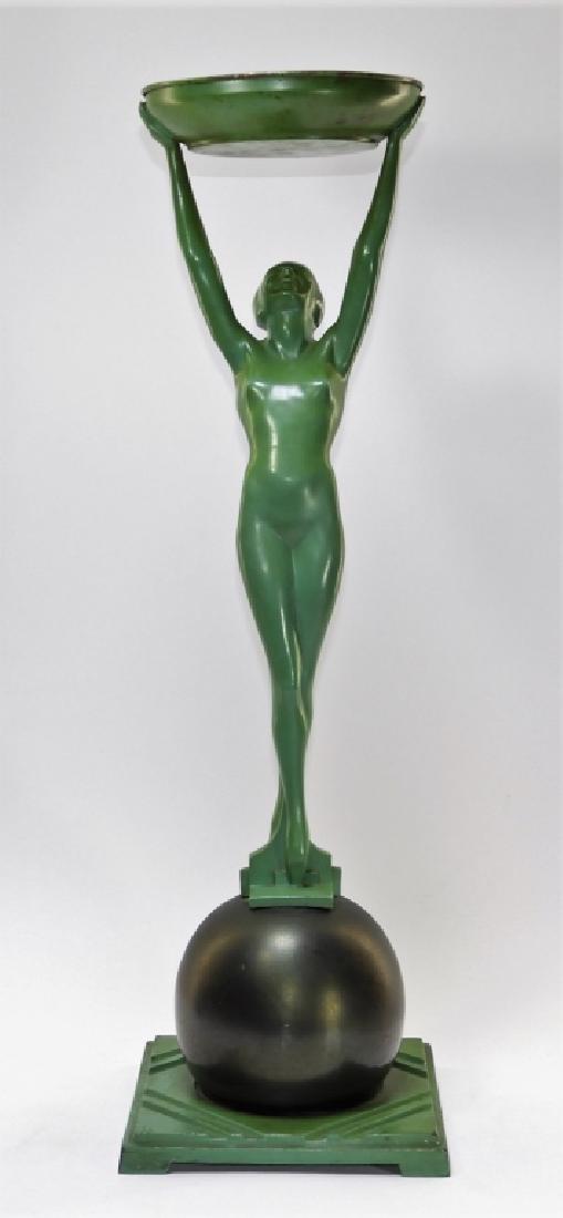 Frankart Art Deco Metal Nude Female Smoking Stand: New York,C.1920 Stylized female form standing en pointe with outstretched arms holding a pan on a gray patinated sphere base with striated diamond pattern platform. Stamped "Frankart (c) Pat. Appl. Fo