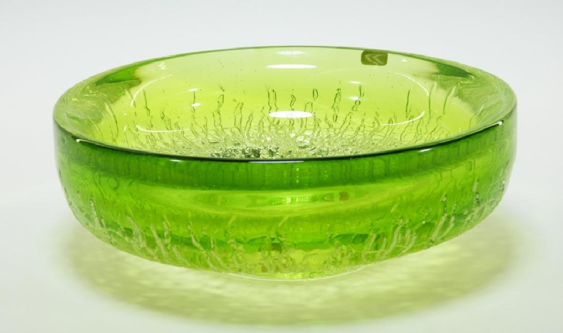 Goran Warff for Kosta Boda Art Glass Bowl: Goran Warff Sweden,b. 1933 Wide lime green footed bowl finished with a textured cracked ice surface. Signed on underside with incised "Kosta Warff 72313", retains original Kosta Boda paper label. From