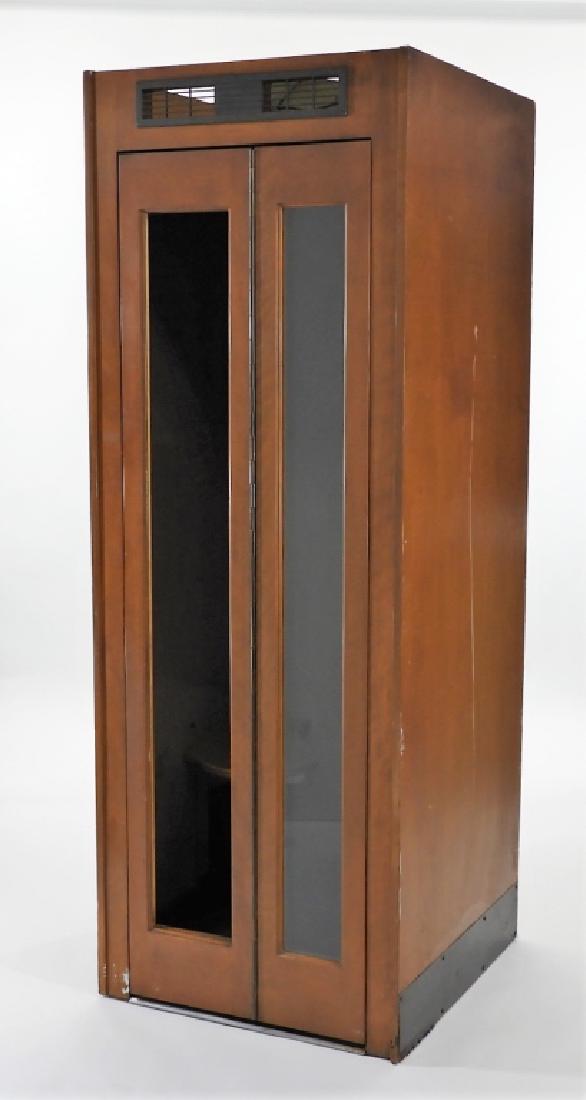 C.1940 Vented Dark Wood Telephone Phone Booth: United States,Circa 1940 Vented dark wood phone booth. Appears to be marked with 61-T inside top mechanical compartment. 83" tall x 30 1/2" square,Maple veneer, metal