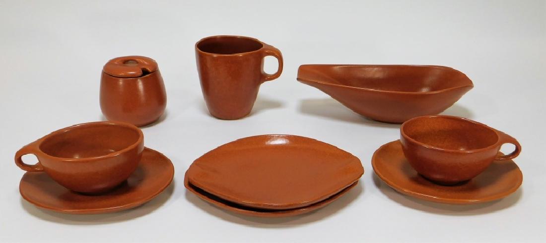 10PC Roseville Raymor Pottery Mustard Pot Group: Ohio,Circa 1952 Includes two 7" saucers with cups, two 8" plates, form number 154, a mug, form number 179, bowl, form number 190, and a rare covered mustard pot. Earthenware Please refer to descriptio