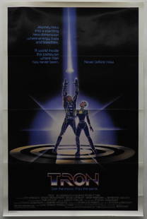 Tron 1982 Disney One Sheet Movie Poster: Walt Disney Productions,1982 A Lisberger-Kushner production. Starring Jeff Bridges, Bruce Boxleitner, and David Warner. Paper,Approx 40 3/4" x 26 3/4"