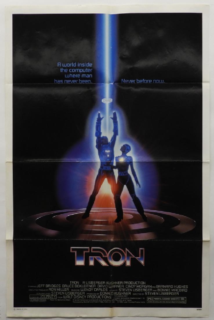 Tron 1982 One Sheet Disney Movie Poster: Walt Disney Productions,1982 A Lisberger- Cushner production. Starring Jeff Bridges, Bruce Boxleitner, and David Warner. #820081 Paper,Approx 40 3/4" x 26 3/4"