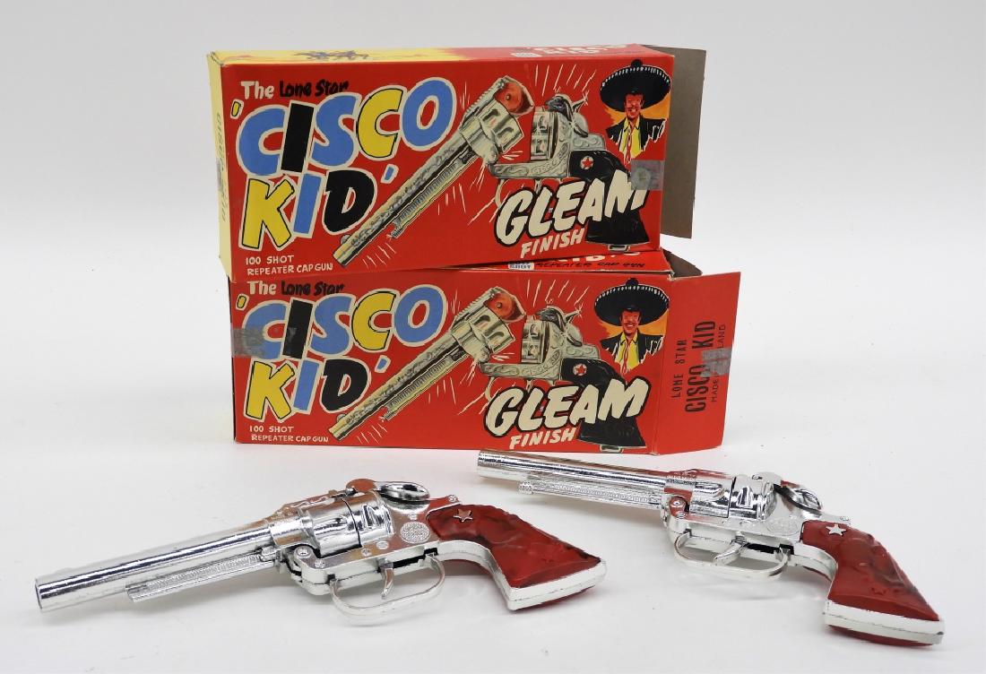 PR Lone Star Cisco Kid Gleam Finish Cap Guns MIB: United States,Mid 20th Century A pair of Lone Star Cisco Kid gleam finish western cap gun pistols, both retain their original box. Pastic, metal, cardboard,Guns measure 8 3/4" long From the collection