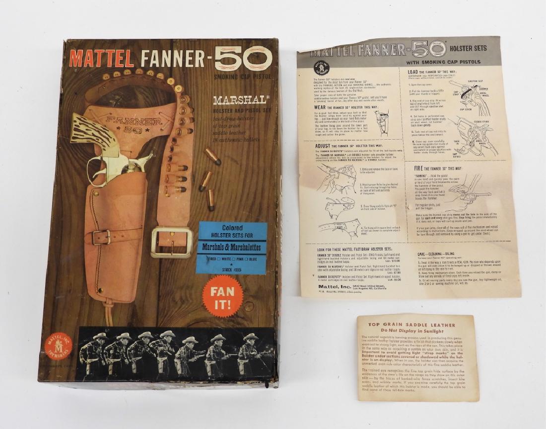 Roy Rogers Double R Bar Ranch Cap Gun Holster Set: United States,Mid 20th Century A Roy Rogers Double R Bar Ranch cap gun set with leather holsters with Roy Rogers crown conchos, studs, and plastic bullets, original guns with faux pearl grips. Plastic