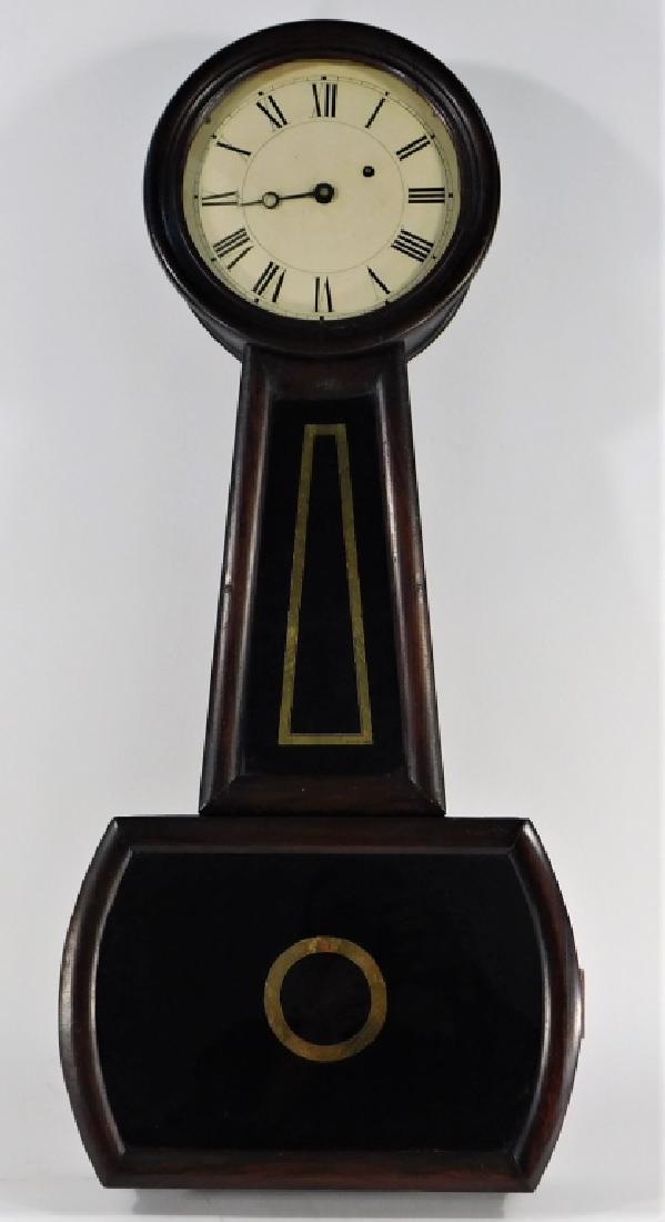 Howard & Davis Boston Model 4 Mahogany Wall Clock: Massachusetts,Circa 1860 White painted Roman numeral dial with eight day weight driven movement within a simple banjo case with eglomised panels. Brass, wood,32" tall x 14" wide, No key and untested,