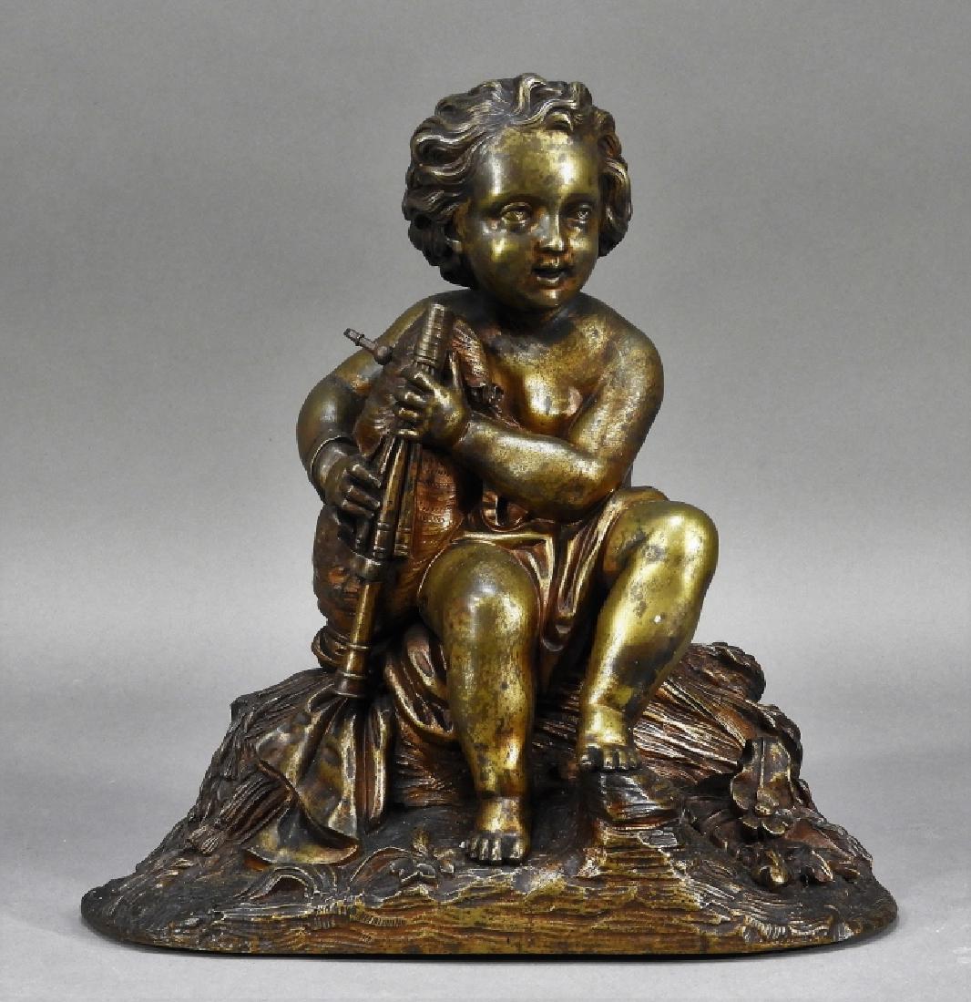 19C. French Ormolu Bronze Model of a Musical Putti: France,Early 19th Century Finely cast sculpture of a putto seated on rockery with tall grass and flowers wearing a robe holding bagpipes. Notice the naturalistic detail of his eyes, hair, fingers, and