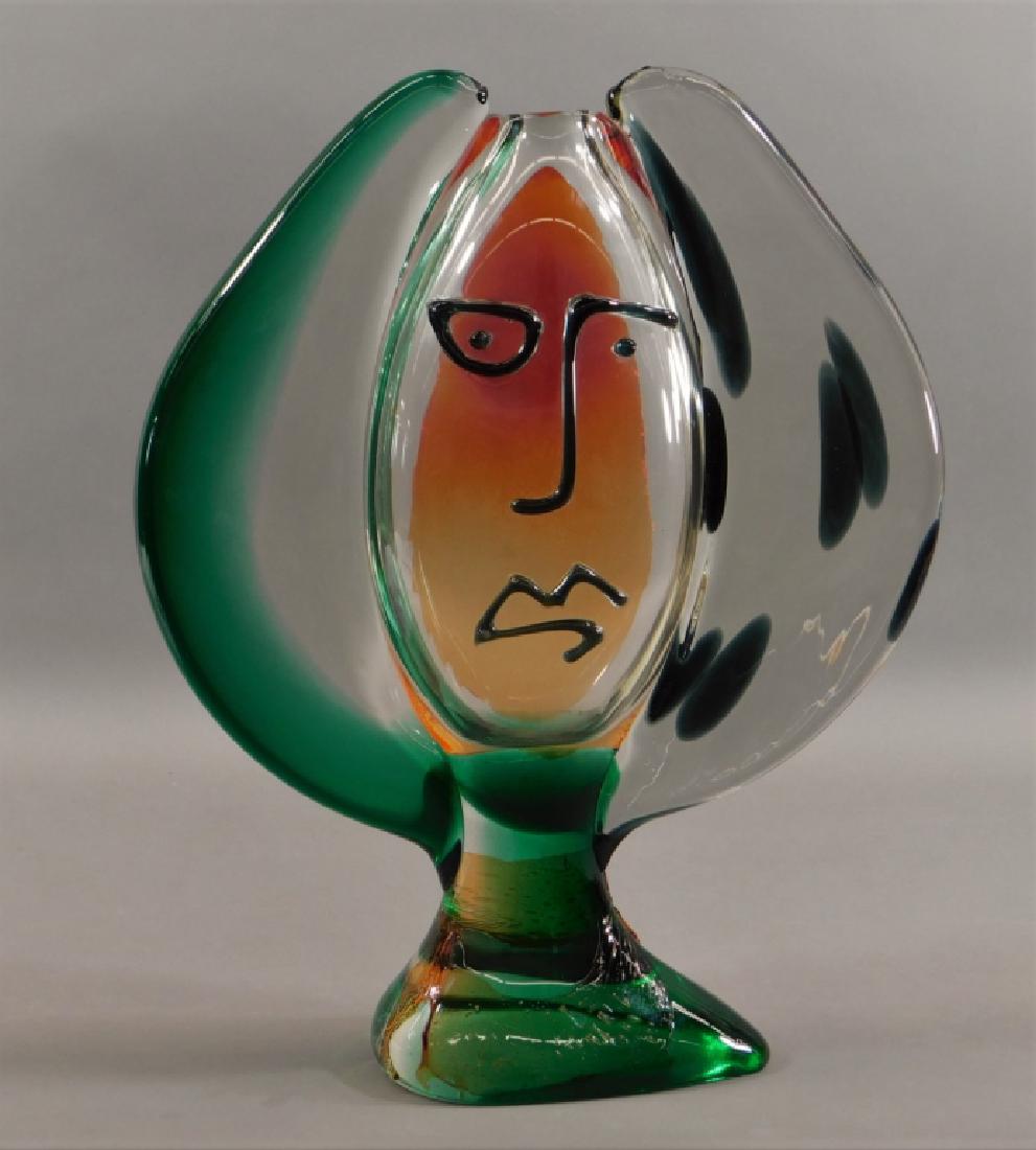 Mario Badioli Picasso Murano Glass Sculpture: Mario Badioli,Italy,20th Century Abstracted figurative form with black, green, and red coloration with Picassoesque facial features. Glass,16" tall x 13" dia., Underside signed " Mario Badioli". From 