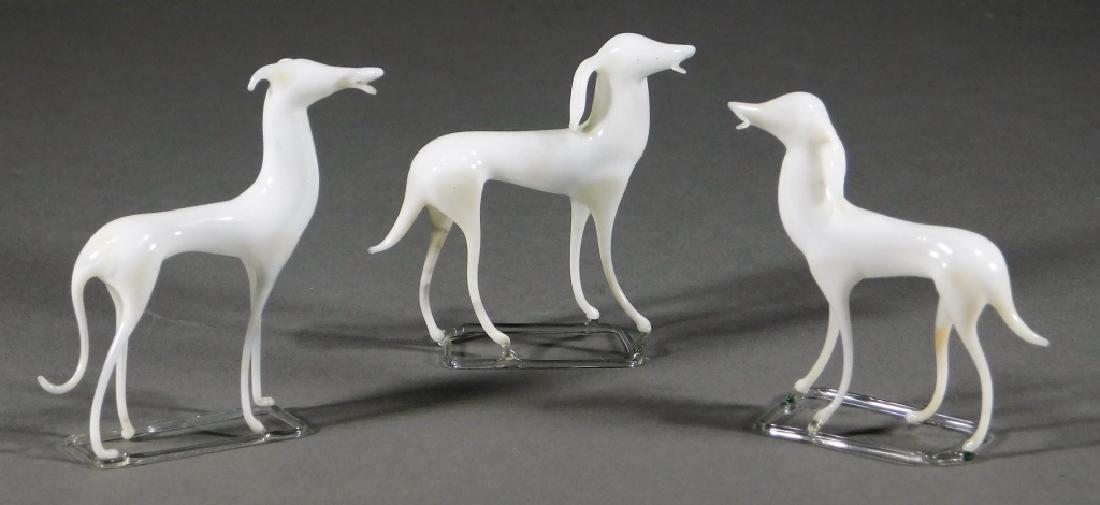 Austrian Fritz Lampl Bimini Art Glass Whippet Dogs: Fritz Lampl,Austria,1892-1955 Group includes three finely modeled whippets in white glass on clear rectangular bases. Glass,Each 3" tall, From the collection of an Uxbridge, Massachusetts gentleman.