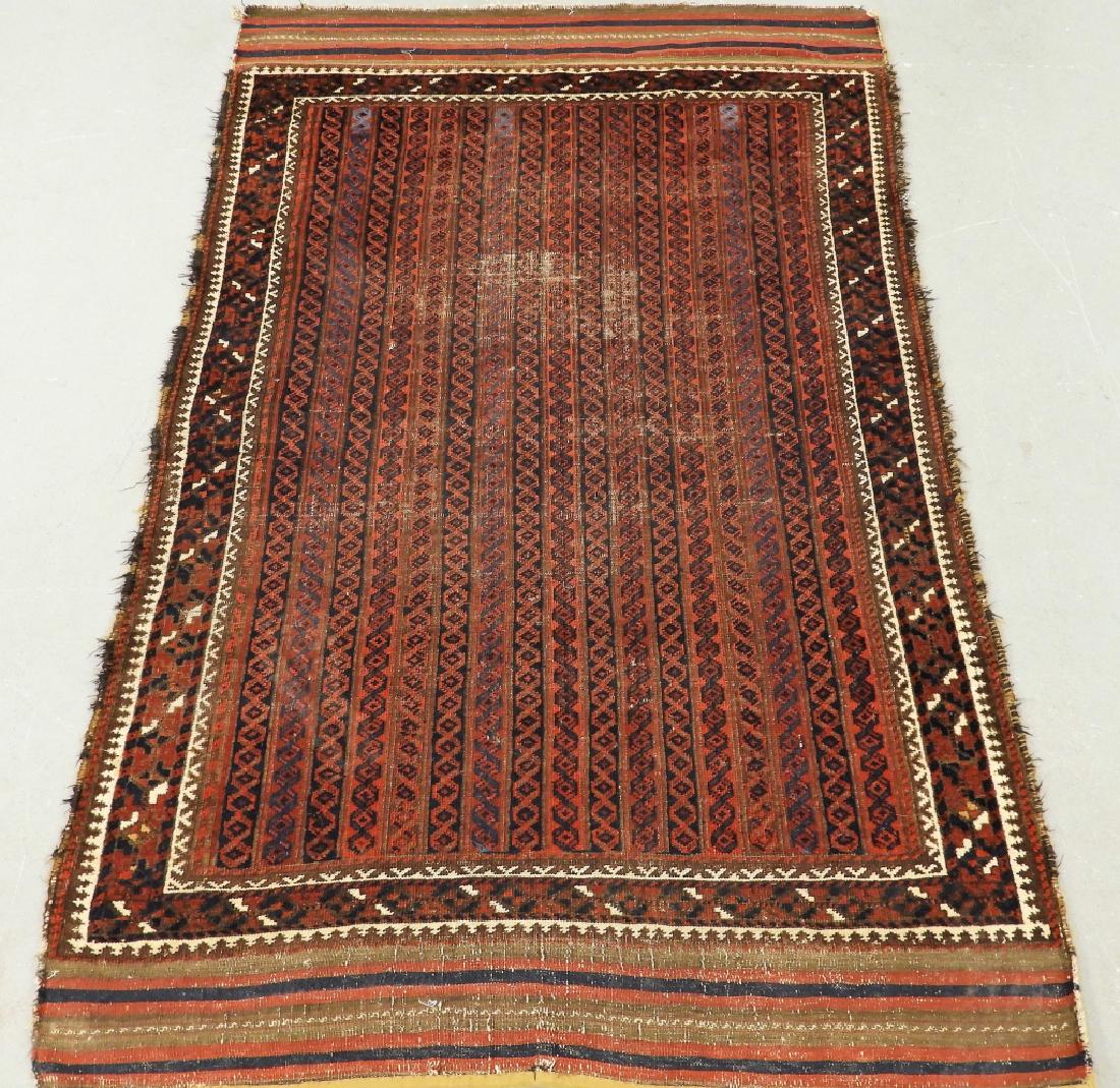 C.1900 Antique Persian Oriental Belouch Carpet Rug: ,Persia,Circa 1900 Central field with colorful geometric line design within a simplistic geometric ivory, red, and blue border. Wool,Overall 6' x 3'8", From a Cape Cod, Massachusetts estate.