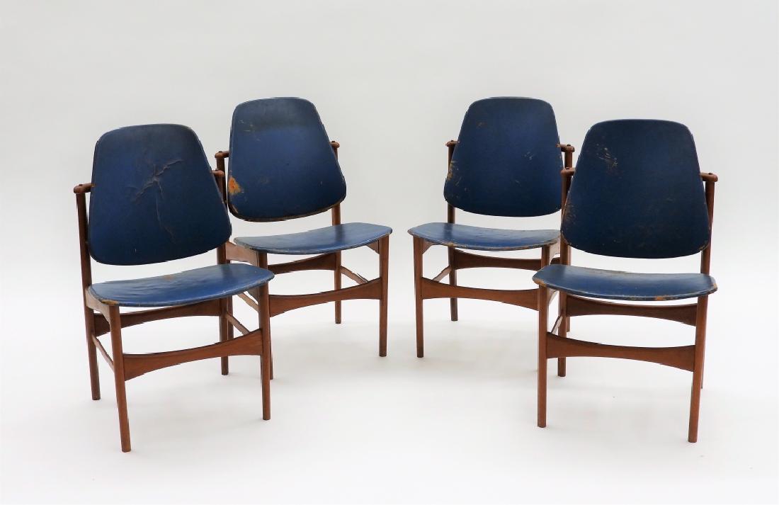 Set of Four Arne Hovmand-Olsen MCM Dining Chairs: Arne Hovmand-Olsen,Denmark,1919-1989 Blue leather seat and slide-in panel back with shapely teakwood frame. Wood, leather,34" tall x 20" wide x 18" deep, From the collection of a Medfield, Massachuset