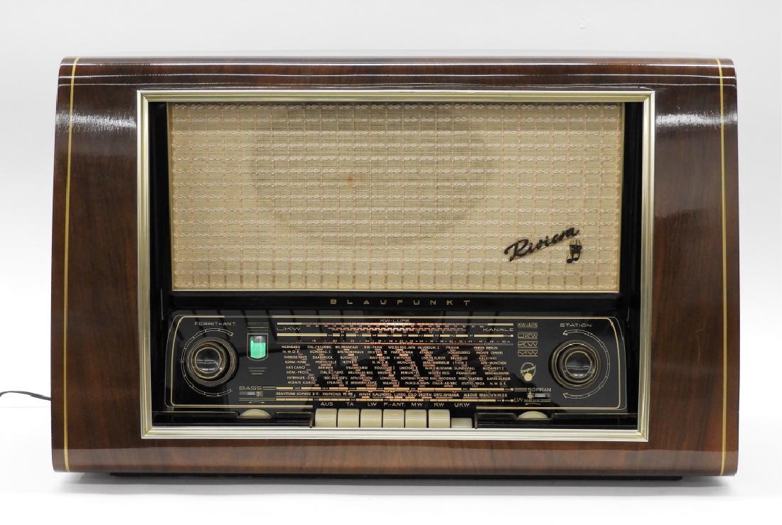 Blaupunkt Riviera 3D AM/FM Art Deco Radio Stereo: ,Germany,Circa 1950 Riviera 3D AM/FM radio manufactured by Blaupunkt, Germany. Wood, metal, and plastic,16" tall x 25 1/2" wide x 10 1/2" deep, From the collection of a Westport, Massachusetts gentlem