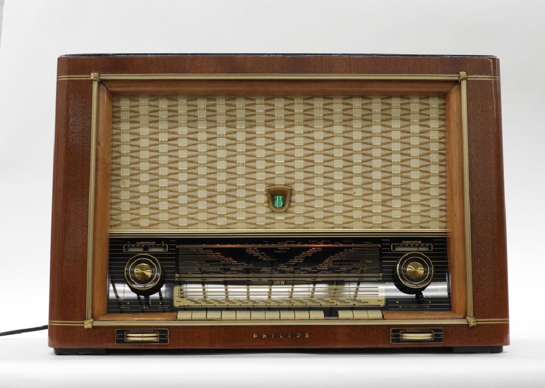 Philips Capella 753 4E 3D AM/FM Modern Radio: ,Holland,Circa 1950 Capella 753 4E 3D radio manufactured by Philips, Holland. Wood, metal, and plastic,17 3/4" tall x 27" wide x 10 1/2" deep, From the collection of a Westport, Massachusetts gentlema