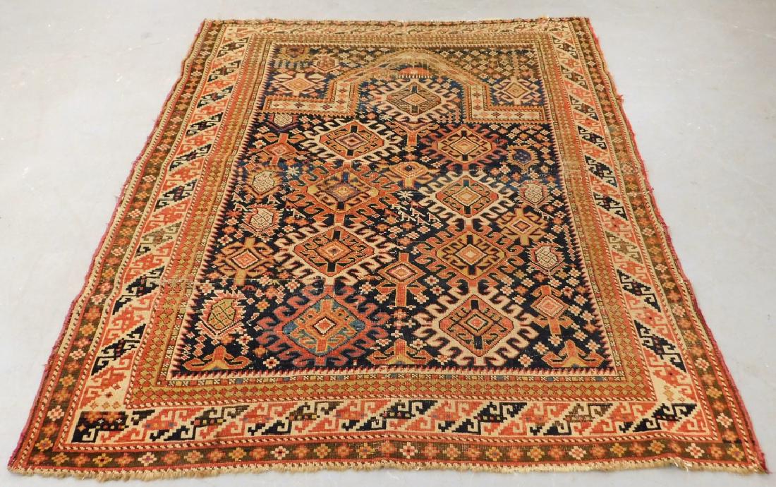 Antique Persian Middle Eastern Shirvan Prayer Rug: ,Caucasus Region,Early 20th Century Eight central diamonds within a directional field over a black ground within multiple geometric borders.,Wool,55 1/4" x 46 1/4", From the collection of a Cambridge,