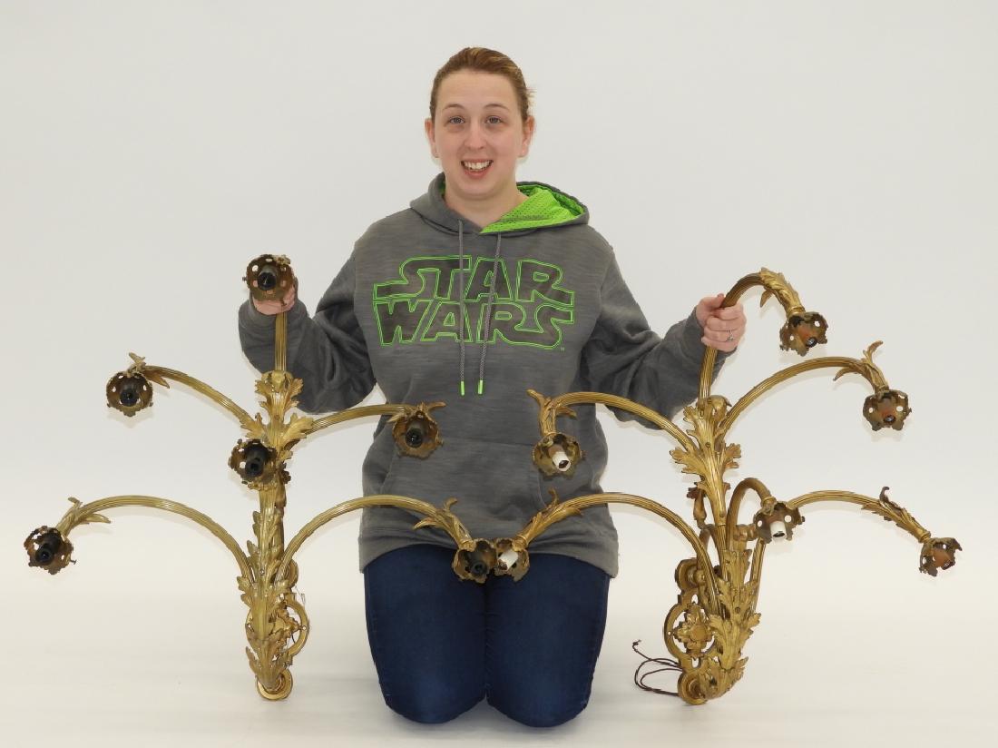 PR French Louis XV Style Gilt Bronze Wall Sconces: ,France,Circa 1940 Large gilt bronze six arm sconces with 2 1/4" shade fitter sockets with acanthus leaf decoration and fancy scrolled wall mount.,Bronze,26" t x 26" w x 14" off wall,