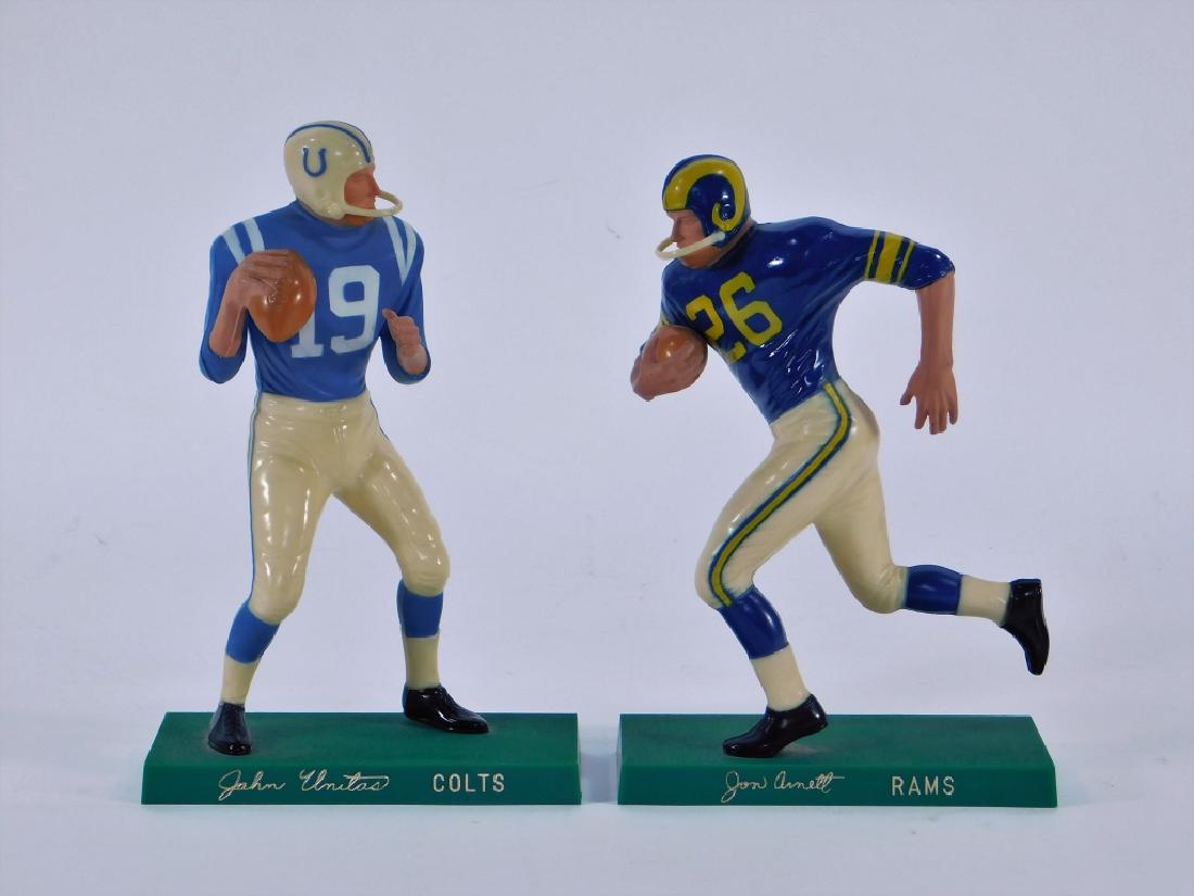 2 Hartland Plastics Unitas Arnett Football Figures: Hartland Plastics,United States,Circa 1959 Group includes Johnny Unitas and Jon Arnett, both limited to a production of 5,000.,Plastic,8" tall, Marked "HARTLAND PLASTICS INC." on underside. From the c