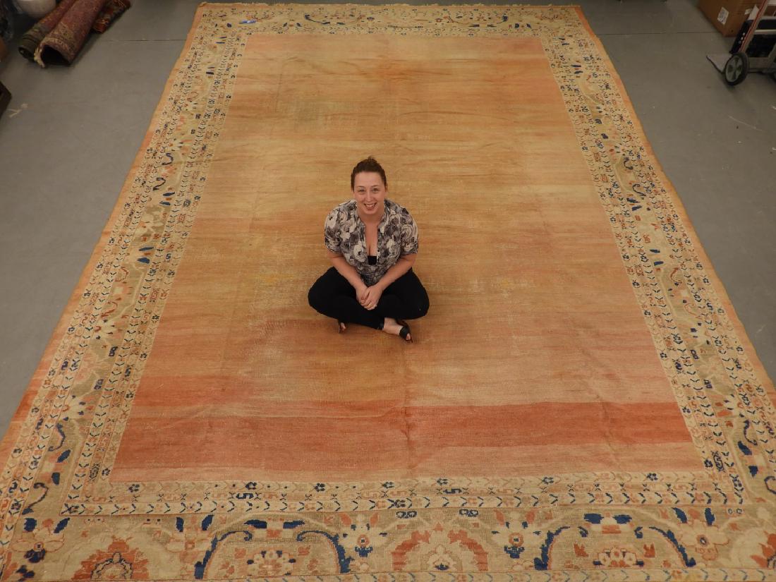 Persian Sultanabad Mahal Room Size Carpet Rug: Persia,Circa 1880 Earth tone center with pinkish hue surrounded by multiple bands of geometric patterns and floral designs. Wool,16' 11" x 11' 11",' From a Cape Cod, Massachusetts estate.