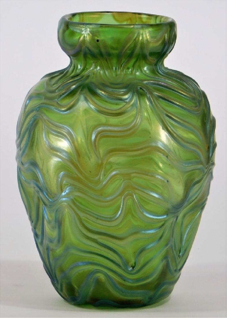 Loetz Green Crete Formosa Art Glass Vase: Czech Republic,20th Century Iridescent baluster form with pinched sides decorated with the Crete Formosa textured pattern. Glass,5 3/4" tall, Underside bears a ground pontil. From the collection of a