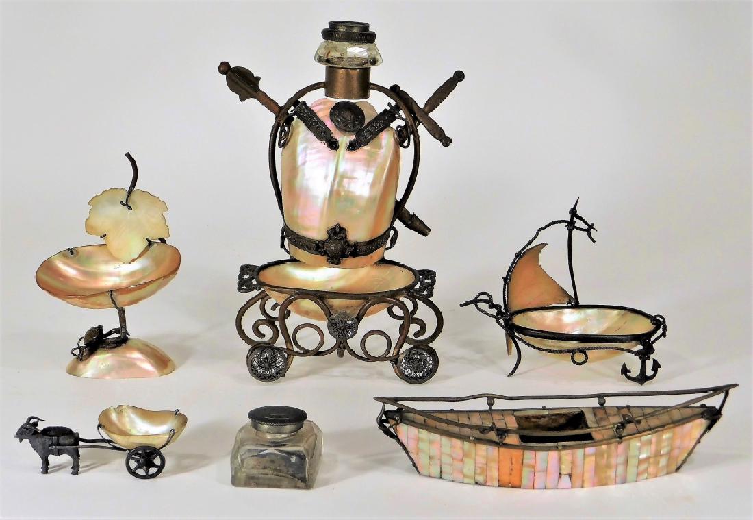 5PC Victorian Abalone Shell Inkwell Desk Set: Europe,Circa 1900 Group includes five mother of pearl abalone shell mounted articles including inkwells and figural bowls, one with a crab the other a goat with cart. Shell, brass, glass,Largest 8 1/4
