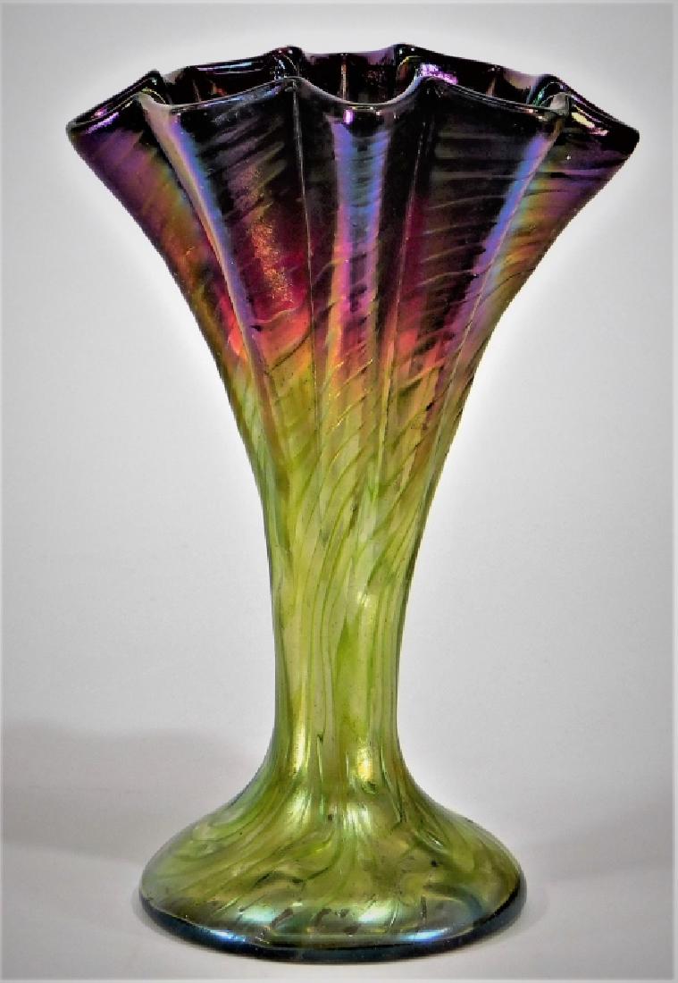 Bohemian Rindskopf Pepita Pleated Fan Glass Vase: Czech Republic,Early 20th Century Fan form with crimped and textured body in gradient iridescent purple to green glass. Glass,6 7/8" tall, Underside bears a ground pontil. From the collection of a Whi