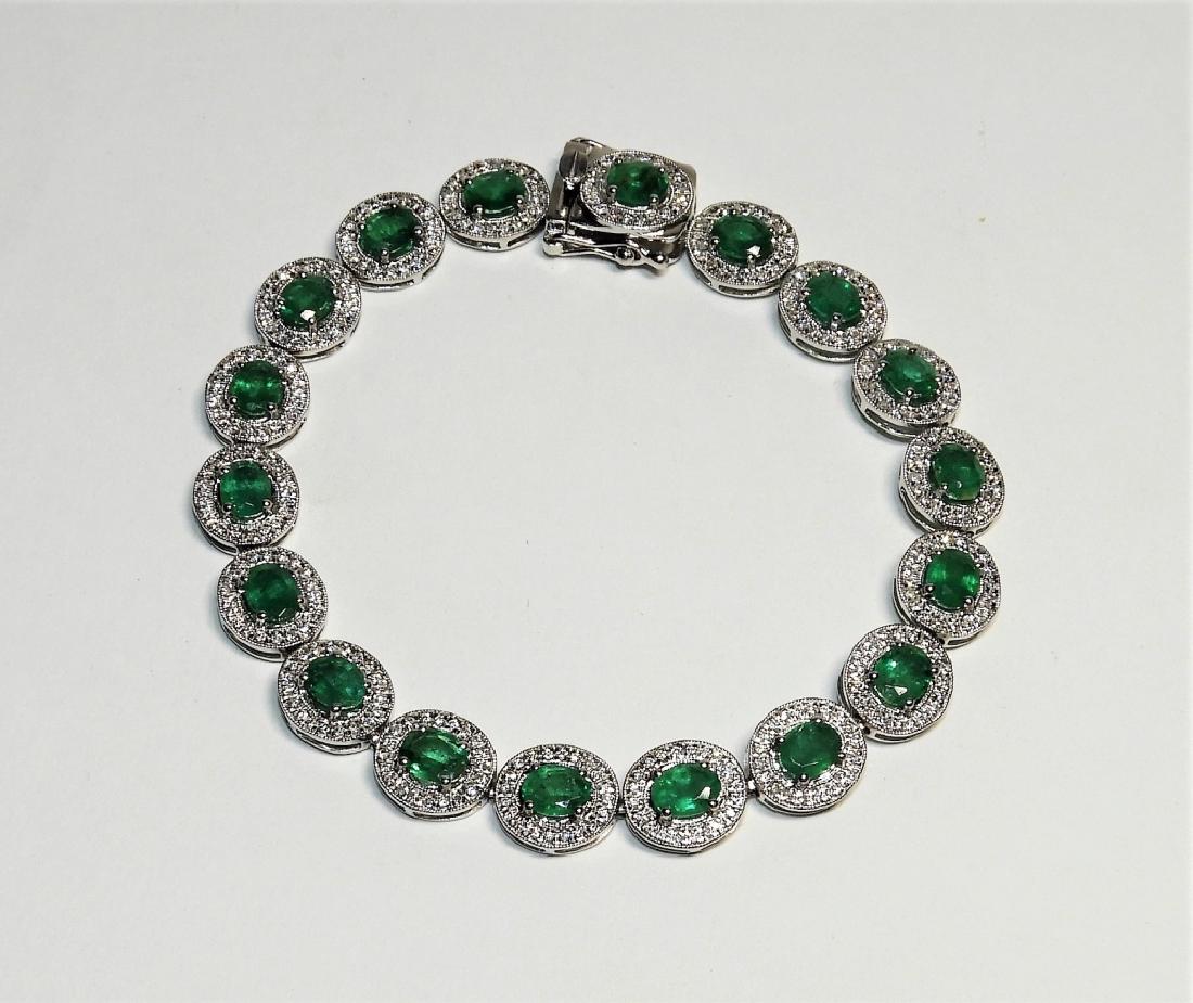 Fine Lady's Emerald & Diamond Platinum Bracelet: Orianne Collins Jewellery United States,Contemporary Elegant cocktail bracelet with eighteen oval-cut natural emeralds 5.44tcw set within diamond encrusted oval bezels and secured by a concealed twin 