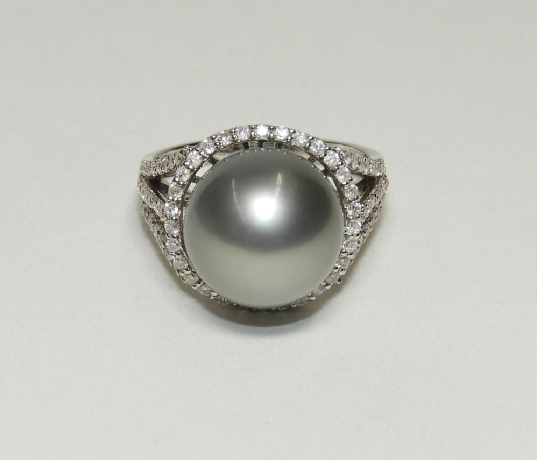 14K White Gold Tahitian Pearl Diamond Lady's Ring: Orianne Collins Jewellery United States,Contemporary 12.0mm Tahitian cultured silver pearl surrounded by a thin halo of round brilliant cut diamonds with an intricate 14K white gold under gallery and 