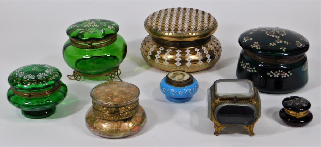 8 Moser Bohemian French Enamel Dresser Jar Group: Europe,19th-20th Century Group includes a large attributed Moser box with allover gilt enameled decoration on clear glass, two green with enameled florals, an aqua blue-green with dogwood flower, clea