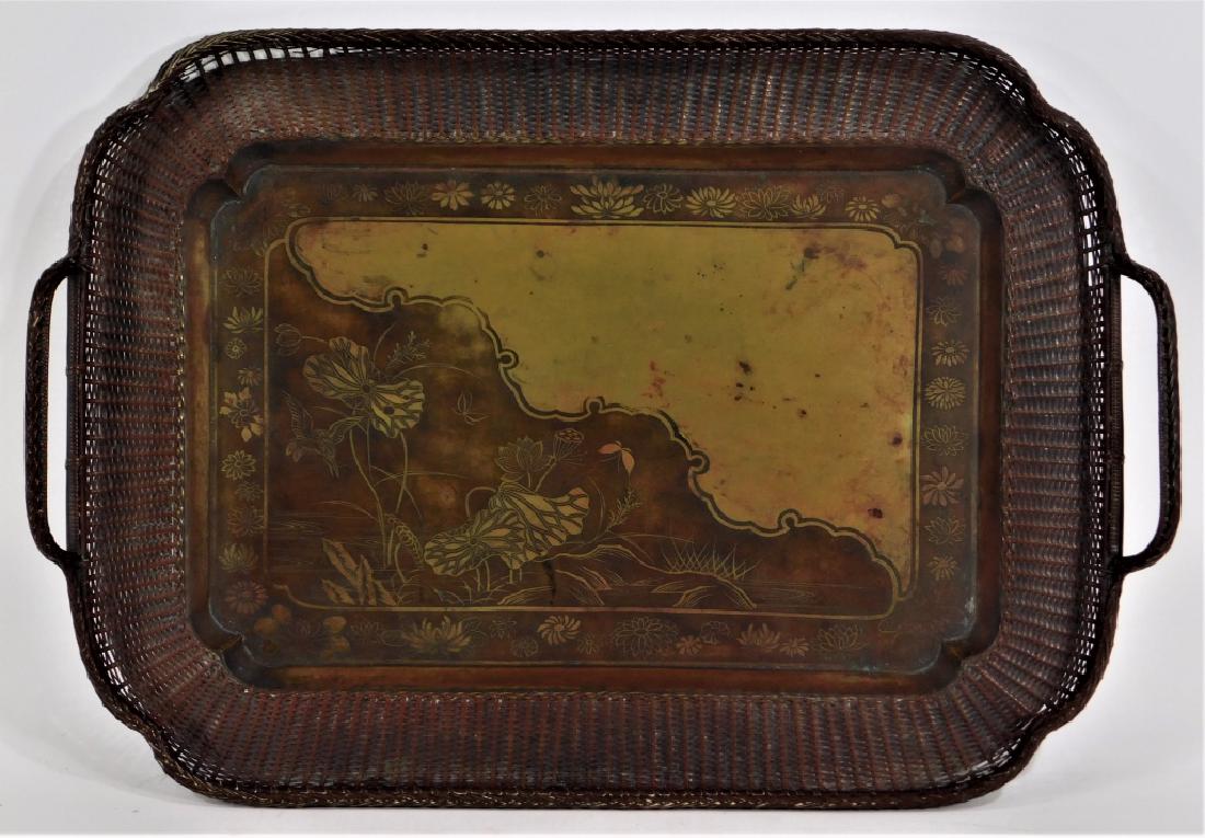 Japanese Meiji Weaved Bronze Ikebana Serving Tray: Japan,19th Century Shaped tray with central etched decoration of a hummingbird, butterflies, and lotus flowers within tightly wefted bronze. Bronze,17" x 12", From the estate of a West Warwick, Rhode 
